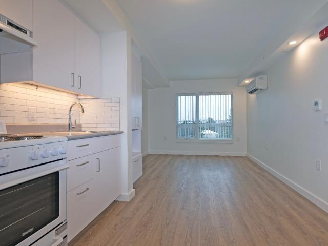Kitchen and living area inside a new unit