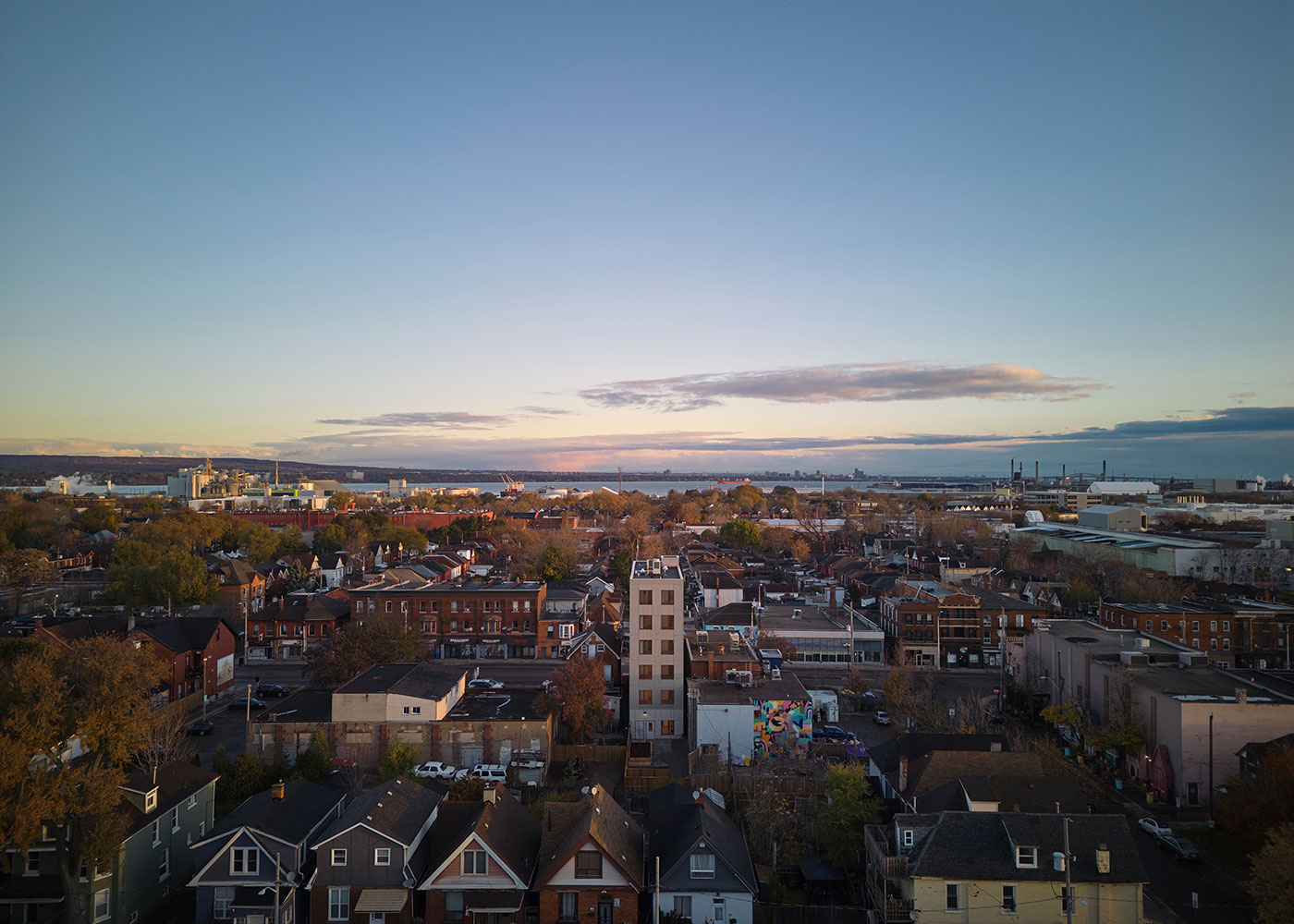 Aerial view toward Hamilton Harbour with 412 Barton centred in the neighbourhood